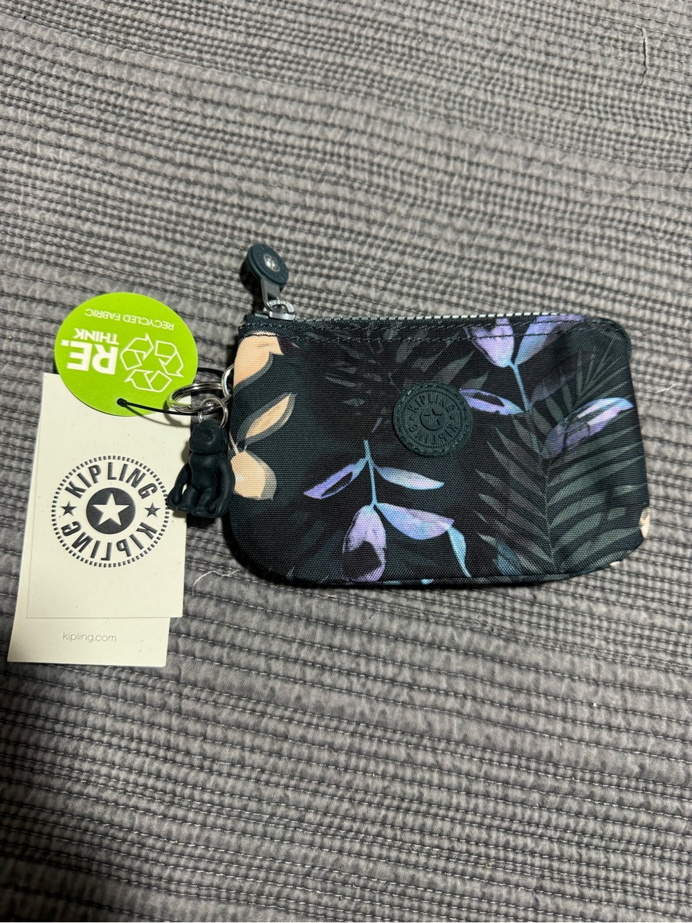 Kipling Small Floral Zip Coin Pouch in Black with Purple and Beige Leaves